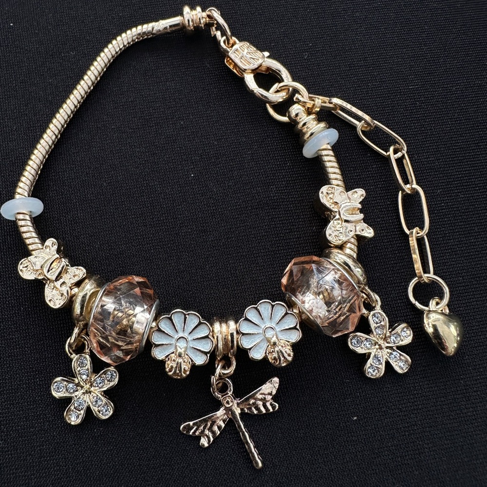 Elegant Gold Charm Bracelet with Floral Accents